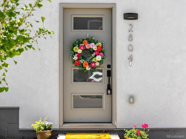2804 W 53rd Ave, Denver, CO 80221 - entrance to property featuring stucco siding