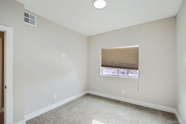 2804 W 53rd Ave, Denver, CO 80221 - carpeted empty room with baseboards