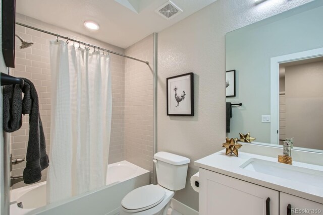 2804 W 53rd Ave, Denver, CO 80221 - full bathroom with toilet, vanity, and shower / tub combo with curtain