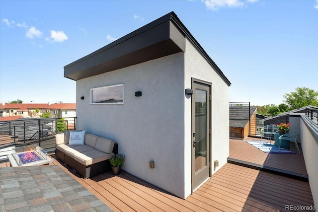2804 W 53rd Ave, Denver, CO 80221 - wooden deck featuring an outdoor living space with a fire pit