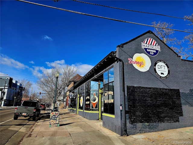 2804 W 53rd Ave, Denver, CO 80221 - view of asphalt street with sidewalks, street lighting, curbs, and traffic lights