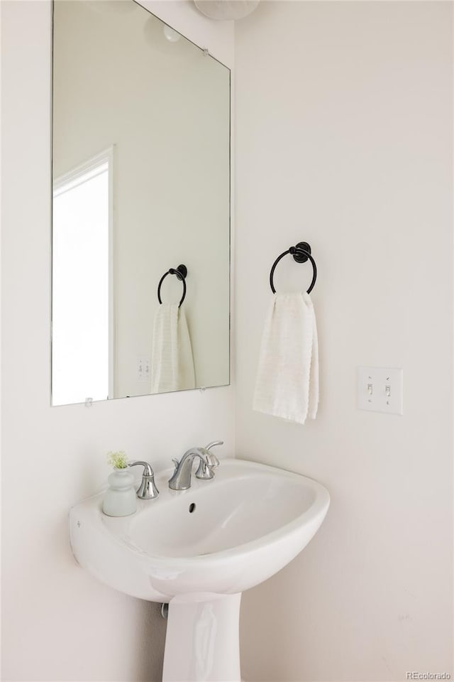 2680 Blake St Unit 12, Denver, CO 80205 - bathroom featuring a sink