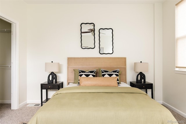 2680 Blake St Unit 12, Denver, CO 80205 - bedroom with a closet, carpet flooring, and baseboards