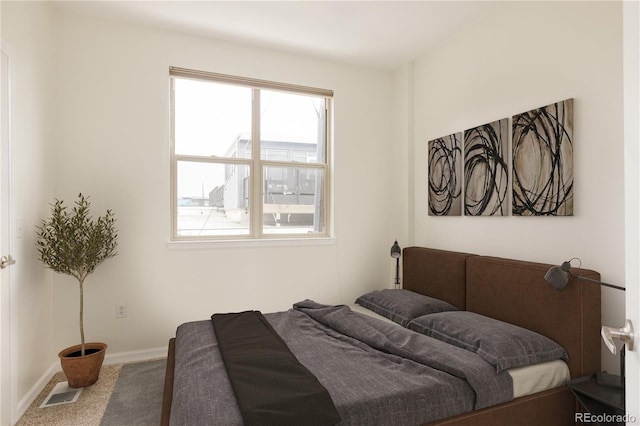 2680 Blake St Unit 12, Denver, CO 80205 - bedroom with carpet floors and baseboards