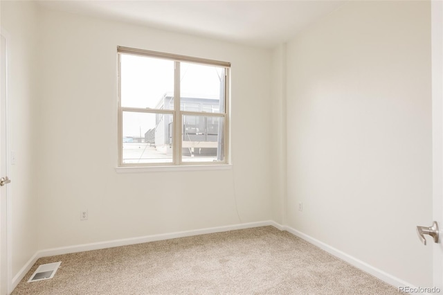 2680 Blake St Unit 12, Denver, CO 80205 - carpeted empty room with baseboards