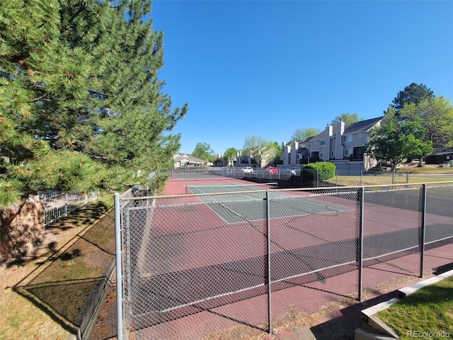 1470 S Quebec Way Unit 46, Denver, CO 80231 - view of tennis court featuring a residential view