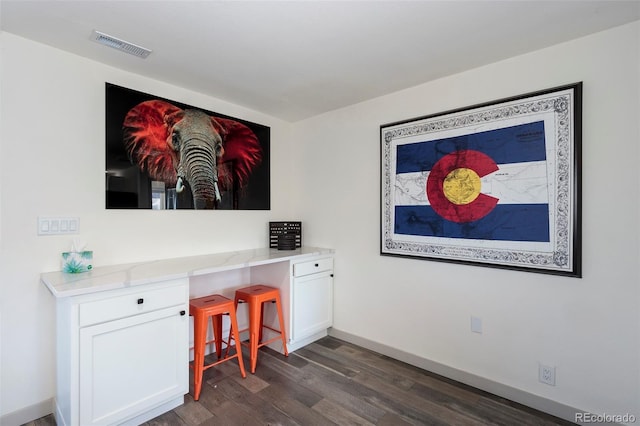 interior space with dark hardwood / wood-style flooring