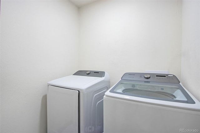 laundry area featuring separate washer and dryer