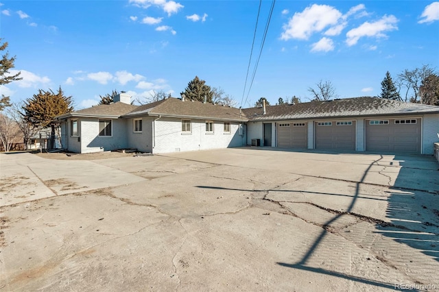 ranch-style home with a garage