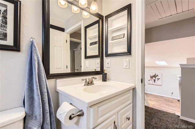 8432 S Upham Way, Littleton, CO 80128 - bathroom with toilet and vanity