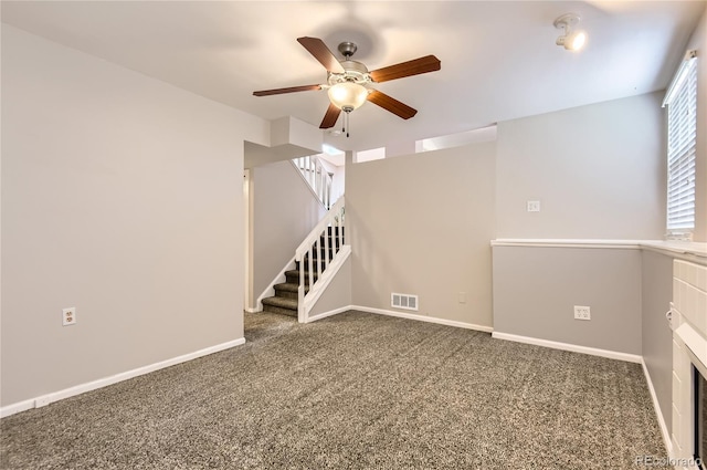 8432 S Upham Way, Littleton, CO 80128 - carpeted spare room featuring a ceiling fan and stairway