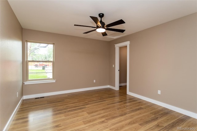 unfurnished room featuring ceiling fan and light hardwood / wood-style floors