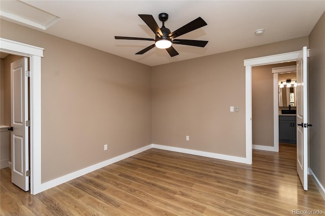 unfurnished bedroom featuring wood-type flooring and ceiling fan