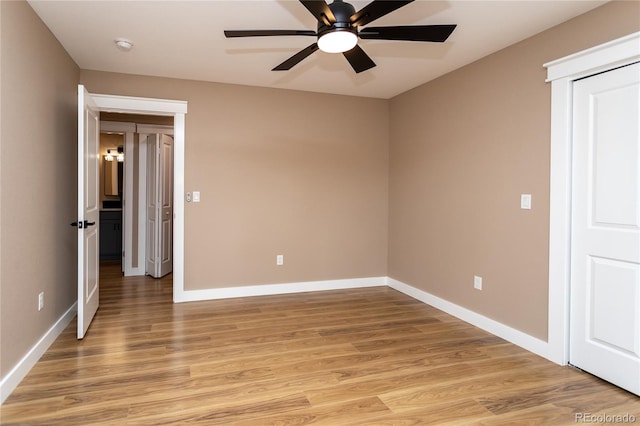 unfurnished bedroom featuring ceiling fan and light hardwood / wood-style floors