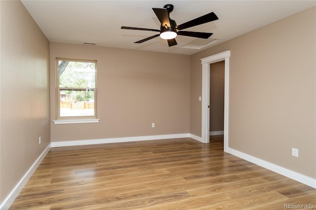 spare room with ceiling fan and light hardwood / wood-style floors