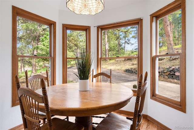 23599 Shingle Creek Rd, Golden, CO 80401 - dining room with a chandelier and wood finished floors