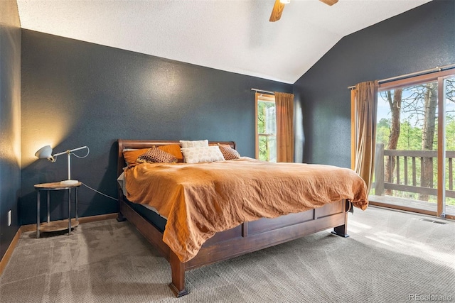 23599 Shingle Creek Rd, Golden, CO 80401 - bedroom featuring vaulted ceiling, access to exterior, carpet flooring, a ceiling fan, and a textured wall