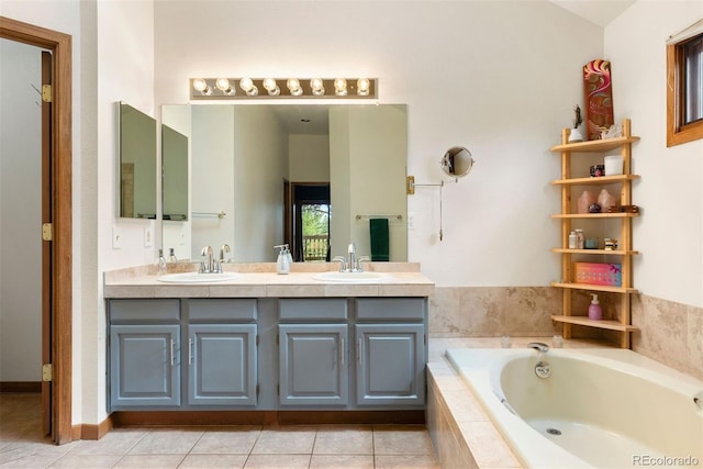 23599 Shingle Creek Rd, Golden, CO 80401 - bathroom featuring a garden tub, double vanity, and tile patterned floors