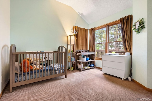 23599 Shingle Creek Rd, Golden, CO 80401 - carpeted bedroom featuring vaulted ceiling, a nursery area, and a textured ceiling