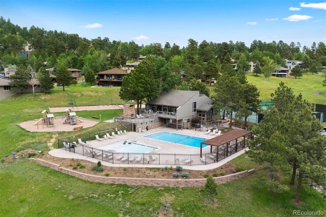 23599 Shingle Creek Rd, Golden, CO 80401 - community pool with a wooden deck and a patio