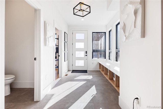2625 W 23rd Ave, Denver, CO 80211 - mudroom with baseboards, tile patterned floors, and recessed lighting