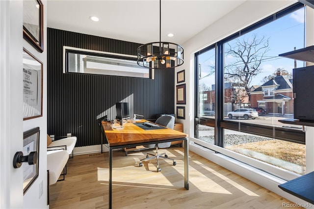 2625 W 23rd Ave, Denver, CO 80211 - office featuring an accent wall, a chandelier, recessed lighting, and wood finished floors