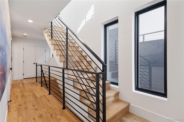 2625 W 23rd Ave, Denver, CO 80211 - staircase featuring baseboards, recessed lighting, and wood finished floors