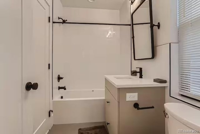 2625 W 23rd Ave, Denver, CO 80211 - bathroom featuring toilet, vanity, and shower / bathing tub combination
