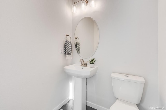 bathroom with sink and toilet