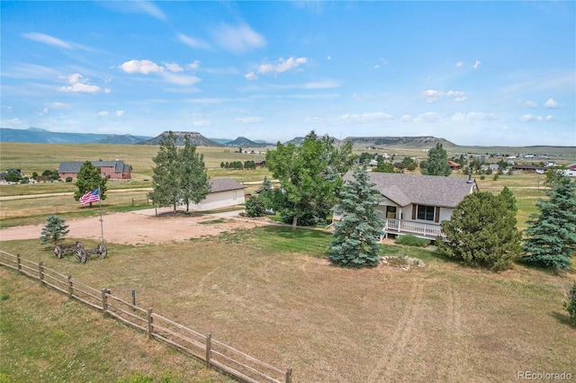 bird's eye view featuring a rural view and a mountain view