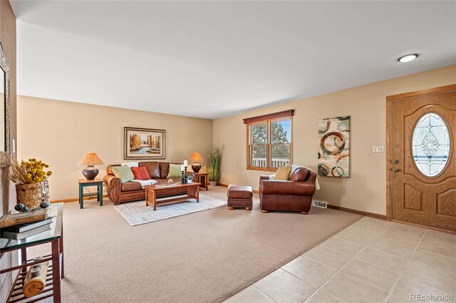 living room featuring light carpet