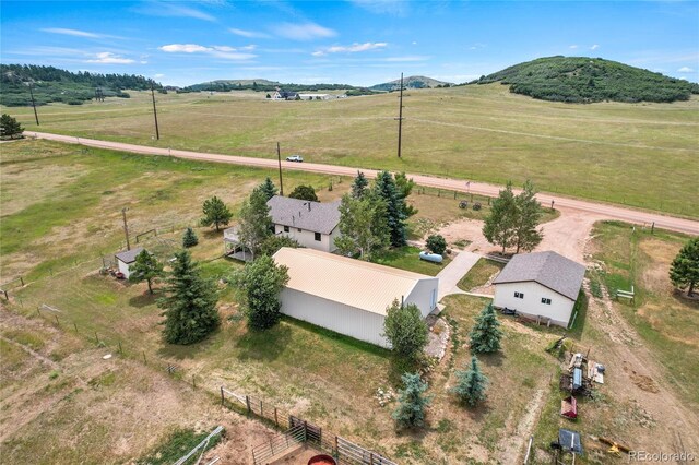 drone / aerial view with a rural view and a mountain view