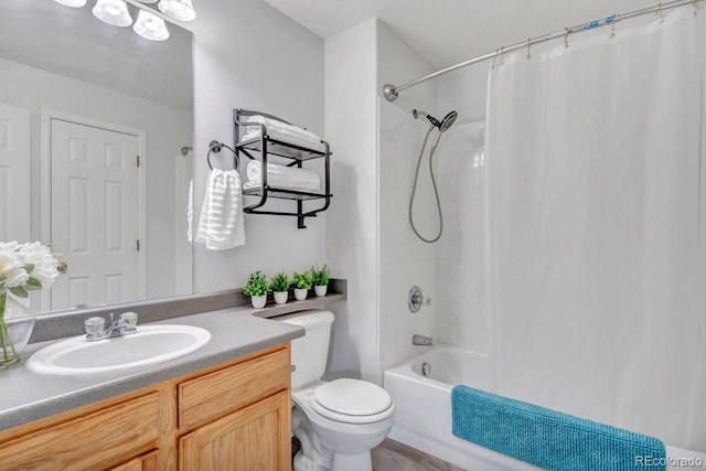 full bathroom featuring vanity, toilet, and shower / tub combo with curtain