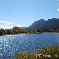 property view of water featuring a mountain view