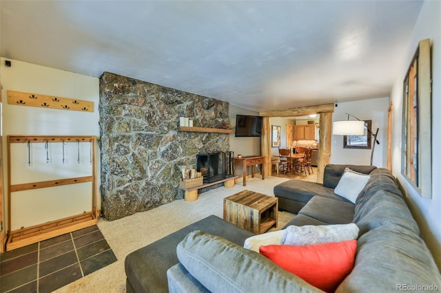 living room featuring a fireplace