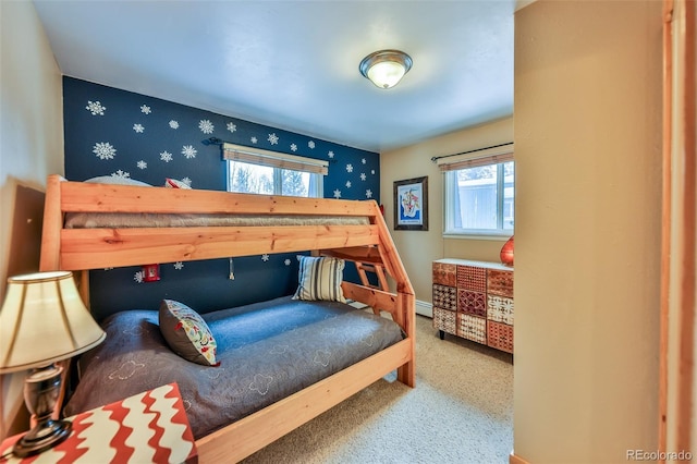 bedroom featuring a baseboard heating unit