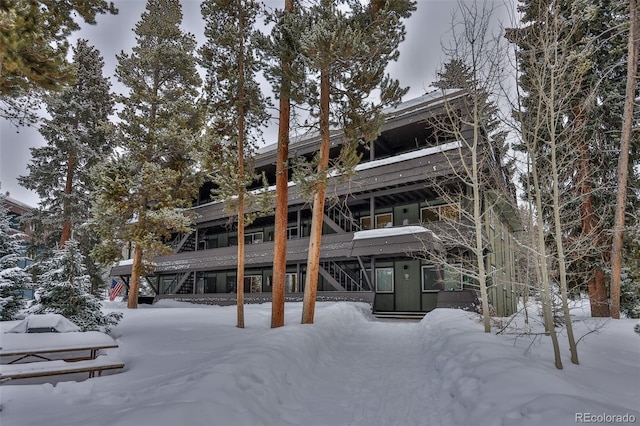 view of snow covered property