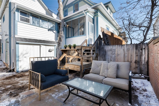 view of snow covered patio