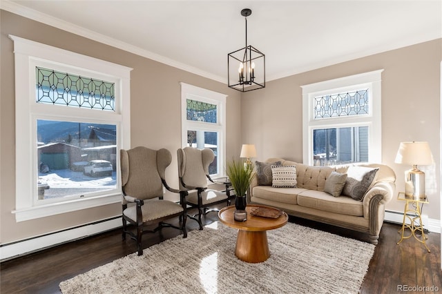 living room featuring dark hardwood / wood-style flooring, crown molding, a chandelier, and baseboard heating