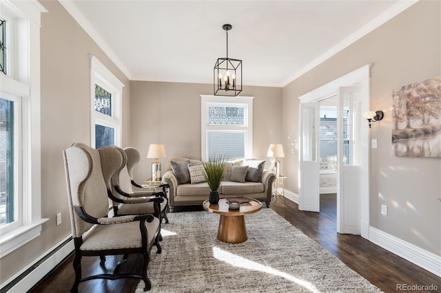 sitting room with crown molding, a baseboard heating unit, a chandelier, and dark hardwood / wood-style flooring