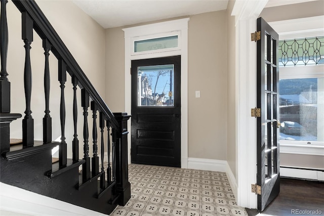 entryway featuring a baseboard radiator