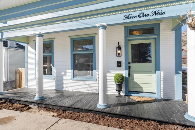 entrance to property with covered porch