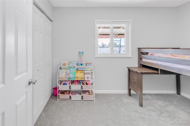 carpeted bedroom featuring a closet