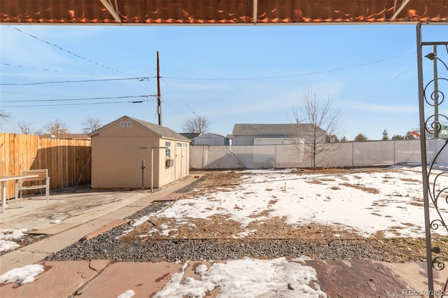 view of yard with a patio and a storage unit