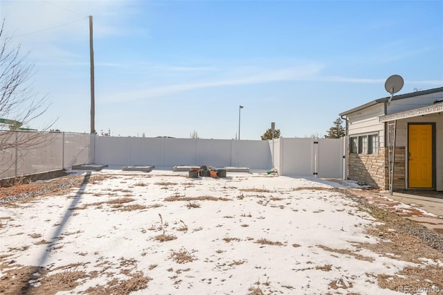 view of yard with a gate and fence