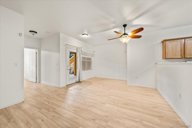 202 Lucca Dr, Evans, CO 80620 - empty room featuring ceiling fan, light wood-style flooring, and baseboards