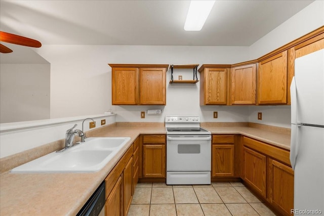 202 Lucca Dr, Evans, CO 80620 - kitchen with white appliances, ceiling fan, brown cabinets, a sink, and light countertops