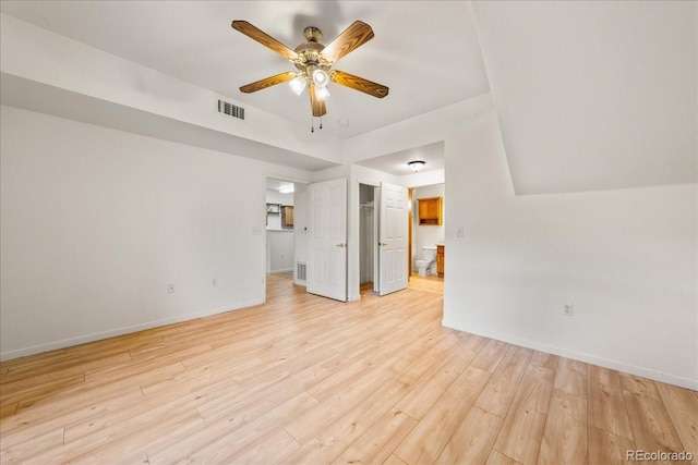 202 Lucca Dr, Evans, CO 80620 - unfurnished living room featuring light wood-style flooring, a ceiling fan, and baseboards