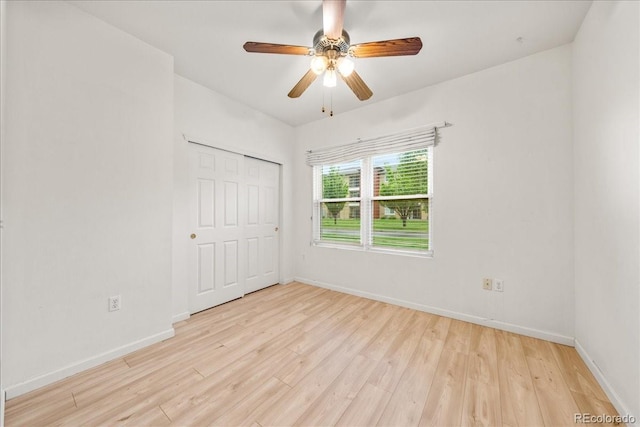 202 Lucca Dr, Evans, CO 80620 - unfurnished bedroom with light wood-style floors, baseboards, a closet, and ceiling fan