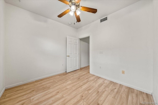 202 Lucca Dr, Evans, CO 80620 - empty room featuring wood finished floors, baseboards, and ceiling fan